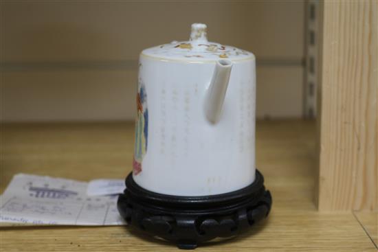 A Chinese famille rose teapot and cover, Daoguang period, wood stand teapot 11cm.